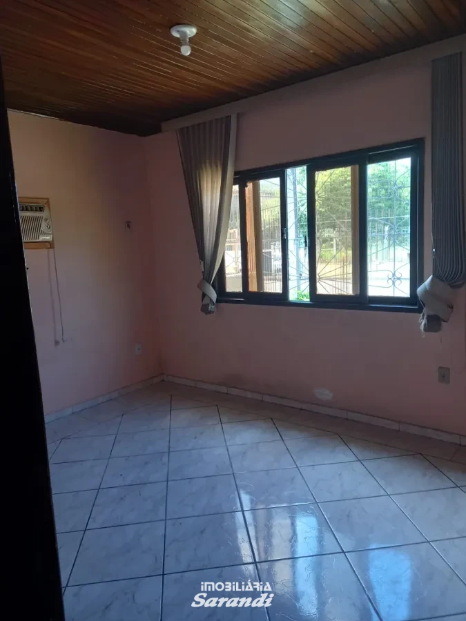 Imagem de Casa de alvenaria de esquina Jardim Ingá três dormitórios um com suíte Porto Alegre