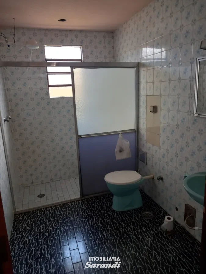 Imagem de Casa de alvenaria de esquina Jardim Ingá três dormitórios um com suíte Porto Alegre