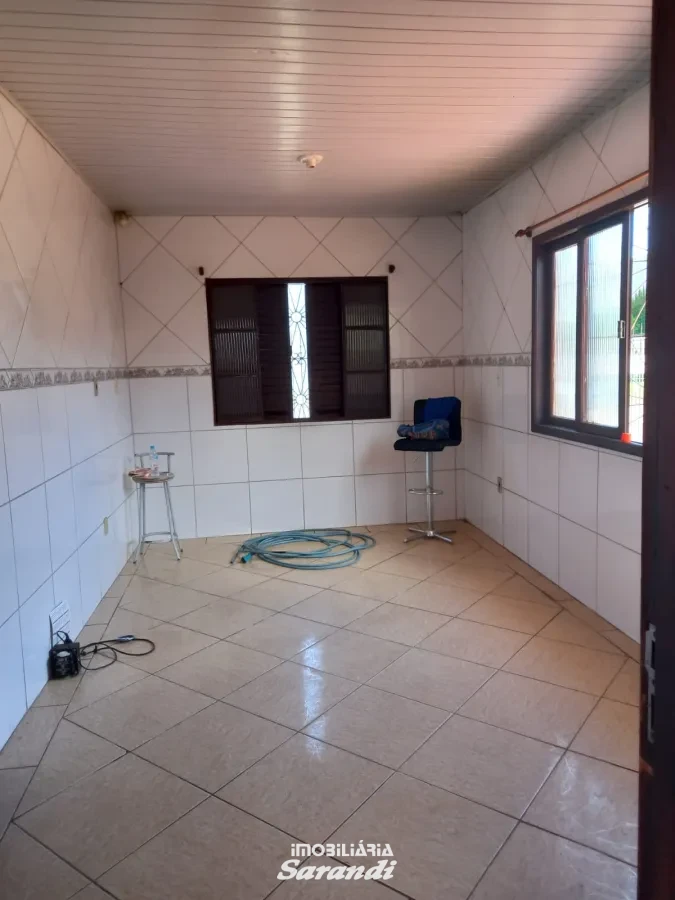 Imagem de Casa de alvenaria de esquina Jardim Ingá três dormitórios um com suíte Porto Alegre