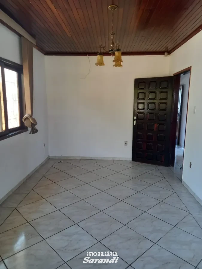 Imagem de Casa de alvenaria de esquina Jardim Ingá três dormitórios um com suíte Porto Alegre