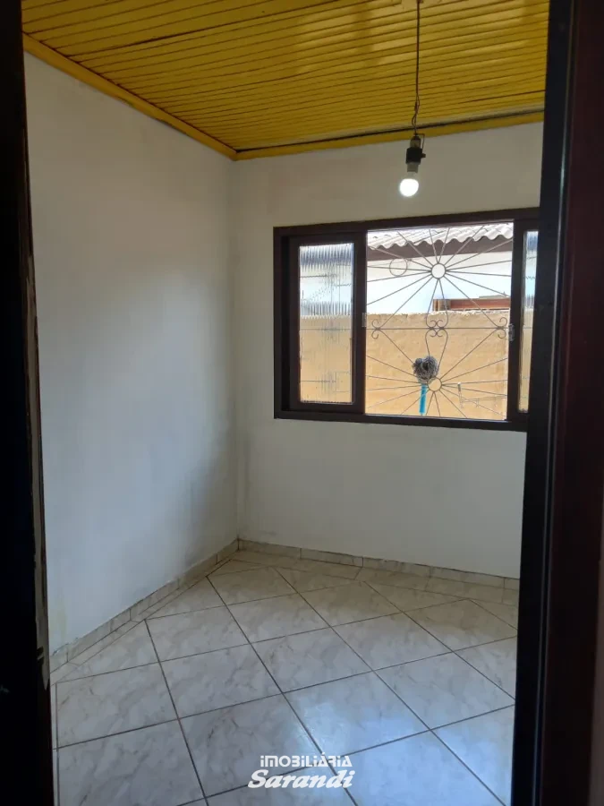 Imagem de Casa de alvenaria de esquina Jardim Ingá três dormitórios um com suíte Porto Alegre