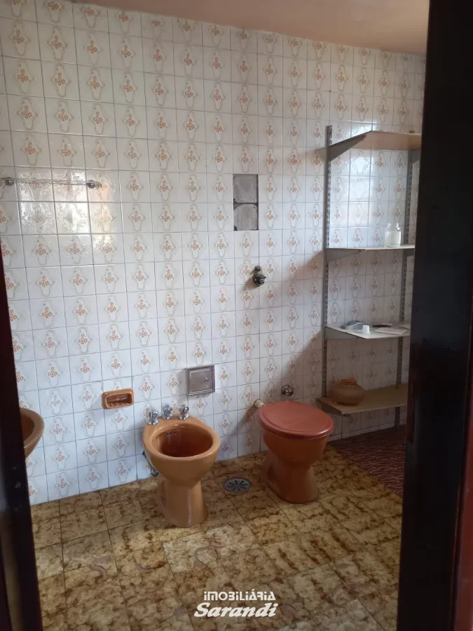 Imagem de Casa de alvenaria de esquina Jardim Ingá três dormitórios um com suíte Porto Alegre