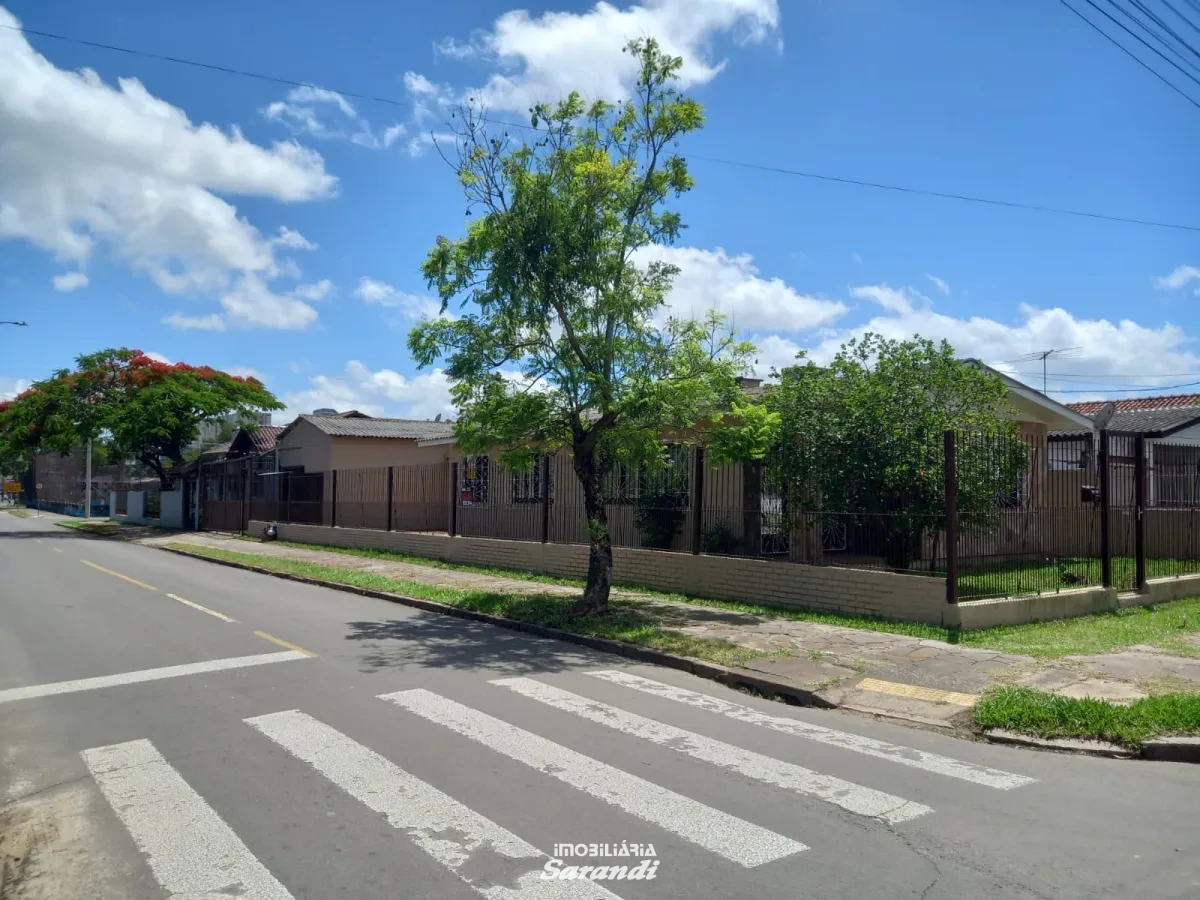 Imagem de Casa de alvenaria de esquina Jardim Ingá três dormitórios um com suíte Porto Alegre