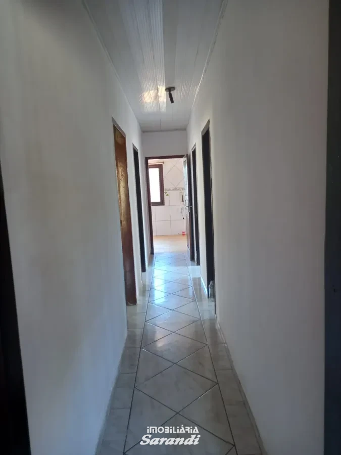 Imagem de Casa de alvenaria de esquina Jardim Ingá três dormitórios um com suíte Porto Alegre