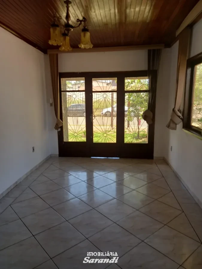 Imagem de Casa de alvenaria de esquina Jardim Ingá três dormitórios um com suíte Porto Alegre