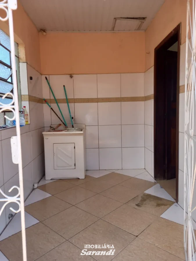 Imagem de Casa de alvenaria de esquina Jardim Ingá três dormitórios um com suíte Porto Alegre