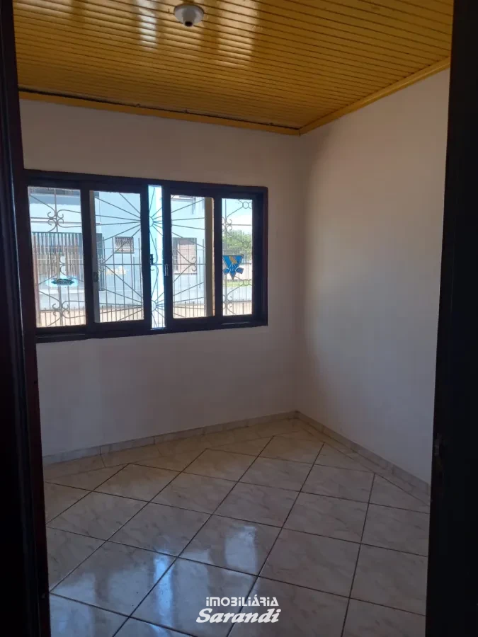 Imagem de Casa de alvenaria de esquina Jardim Ingá três dormitórios um com suíte Porto Alegre