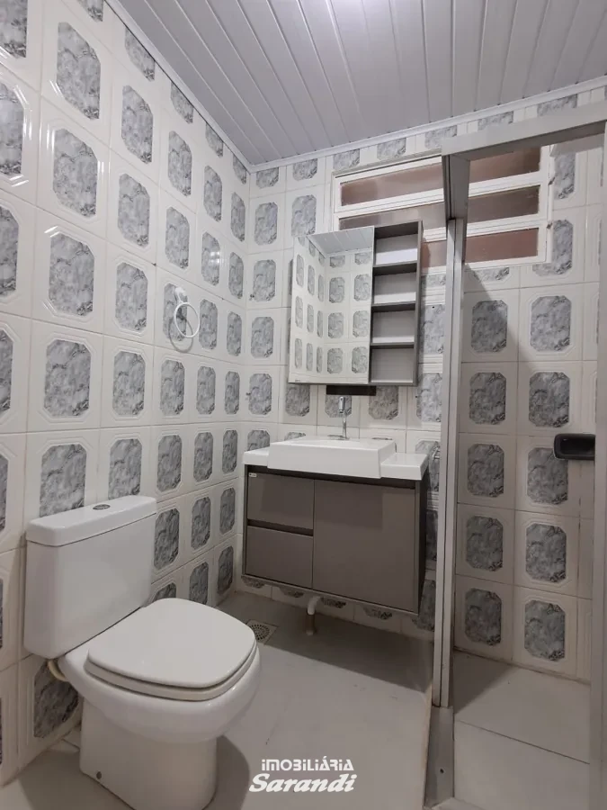 Casa de alvenaria dois dormitórios piscina quiosqui e peça nos fundos com churrasqueira - Sarandi, Porto Alegre [4187]