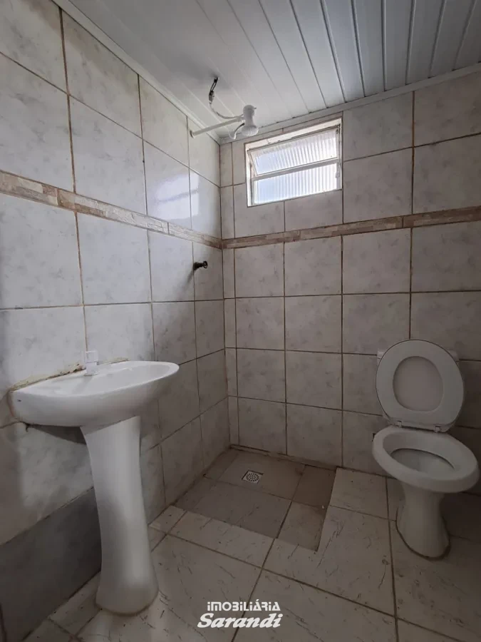 Casa de alvenaria dois dormitórios piscina quiosqui e peça nos fundos com churrasqueira - Sarandi, Porto Alegre [4187]