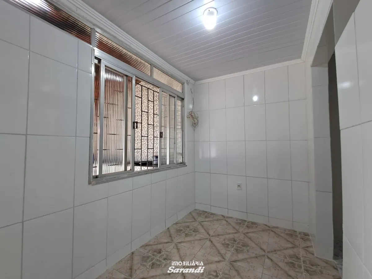 Casa de alvenaria dois dormitórios piscina quiosqui e peça nos fundos com churrasqueira - Sarandi, Porto Alegre [4187]