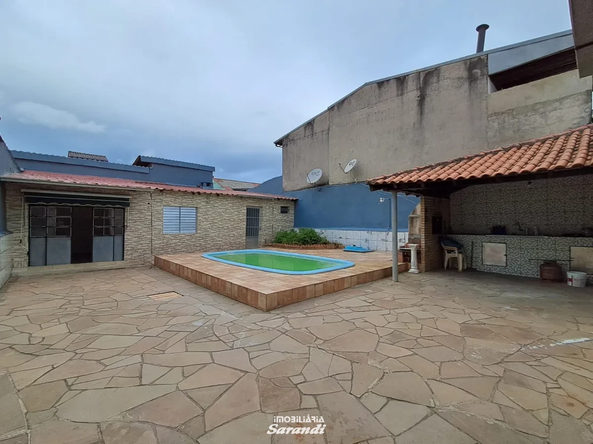 Casa de alvenaria dois dormitórios piscina quiosqui e peça nos fundos com churrasqueira - Sarandi, Porto Alegre [4187]