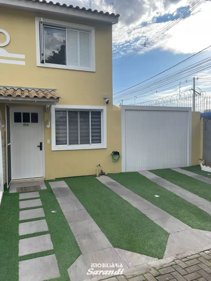 VENHA CONHECER IMÓVEL DIFERENCIADO: Sobrado alvenaria três dormitórios, sala estar jantar, cozinha planejada e vagas para três carros. - Sarandi, Porto Alegre [4266]
