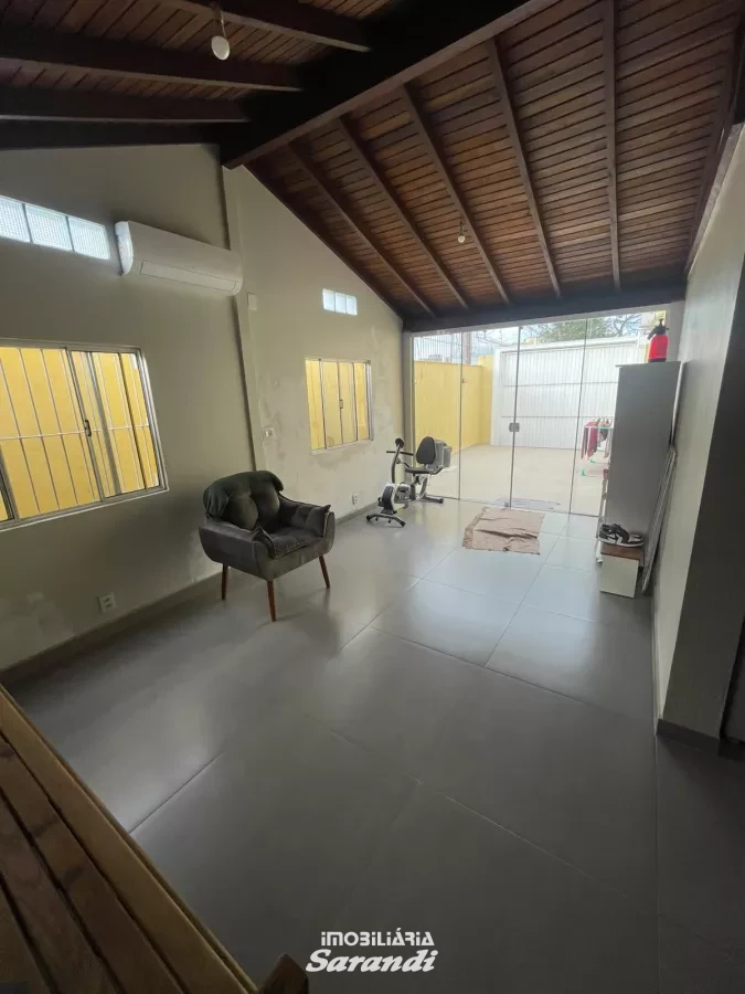 VENHA CONHECER IMÓVEL DIFERENCIADO: Sobrado alvenaria três dormitórios, sala estar jantar, cozinha planejada e vagas para três carros. - Sarandi, Porto Alegre [4266]