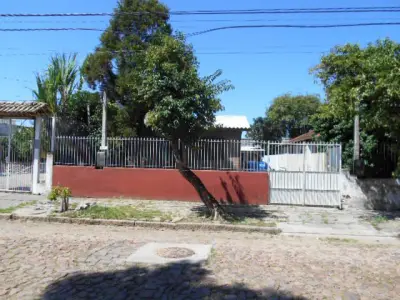 Imagem de Terreno com área de 300,00m2 com 10,00 metros de frente com duas casas construídas bairro sarandi em Porto Alegre