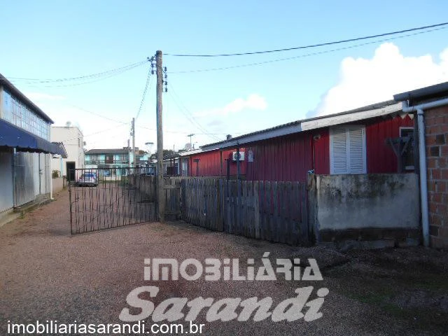 Imagem de Terreno com casas e galpões no bairro Rubem Berta