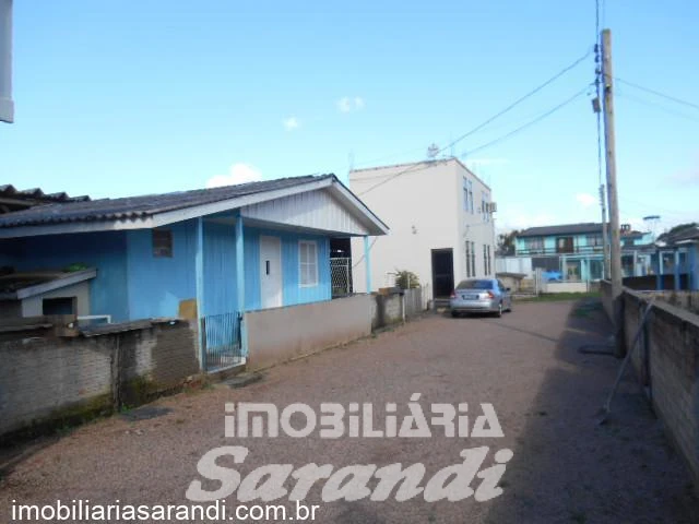 Imagem de Terreno com casas e galpões no bairro Rubem Berta