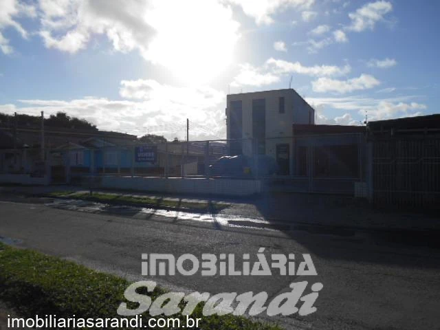 Imagem de Terreno com casas e galpões no bairro Rubem Berta