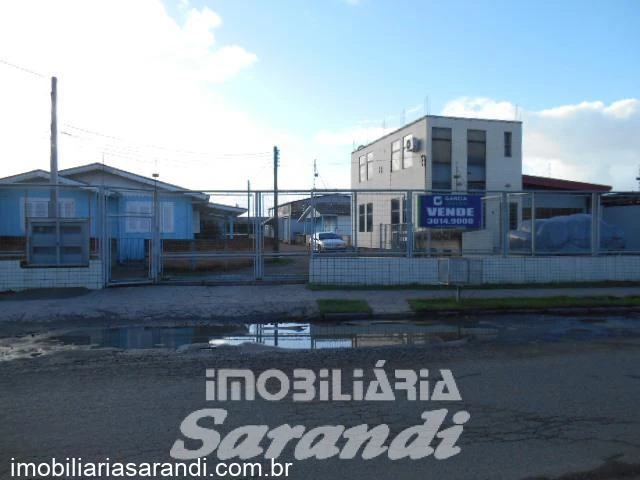 Imagem de Terreno com casas e galpões no bairro Rubem Berta