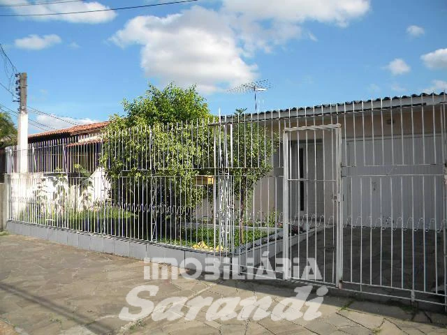 Imagem de Terreno com 2 casas de alvenaria com garagem coberta para 3 carros no bairro Sarandi