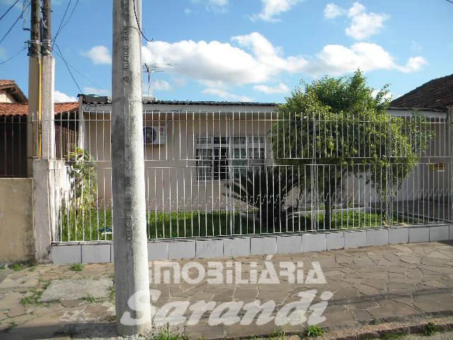 Imagem de Terreno com 2 casas de alvenaria com garagem coberta para 3 carros no bairro Sarandi