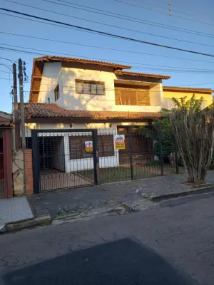 Imagem de Sobrado de alvenaria com quatro dormitórios uma suite no bairro sarandi Porto Alegre