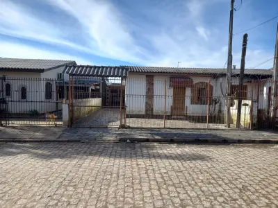 Imagem de Casa de alvenaria com três dormitórios bairro rubem berta Porto Alegre
