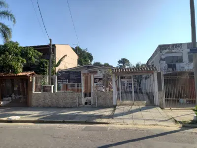 Imagem de Casa mista com três dormitórios bairro sarandi Porto Alegre