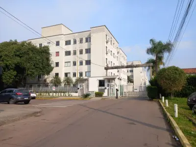 Imagem de Apartamento com garagem coberta dois dormitórios bairro Santa Fé Porto Alegre