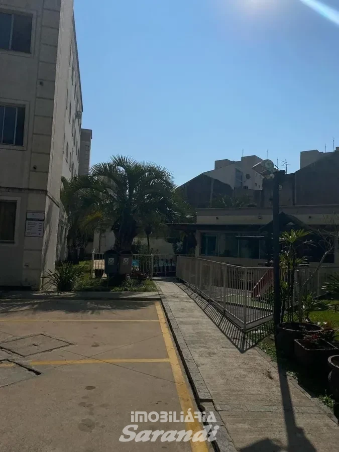 Imagem de Apartamento com garagem coberta dois dormitórios bairro Santa Fé Porto Alegre