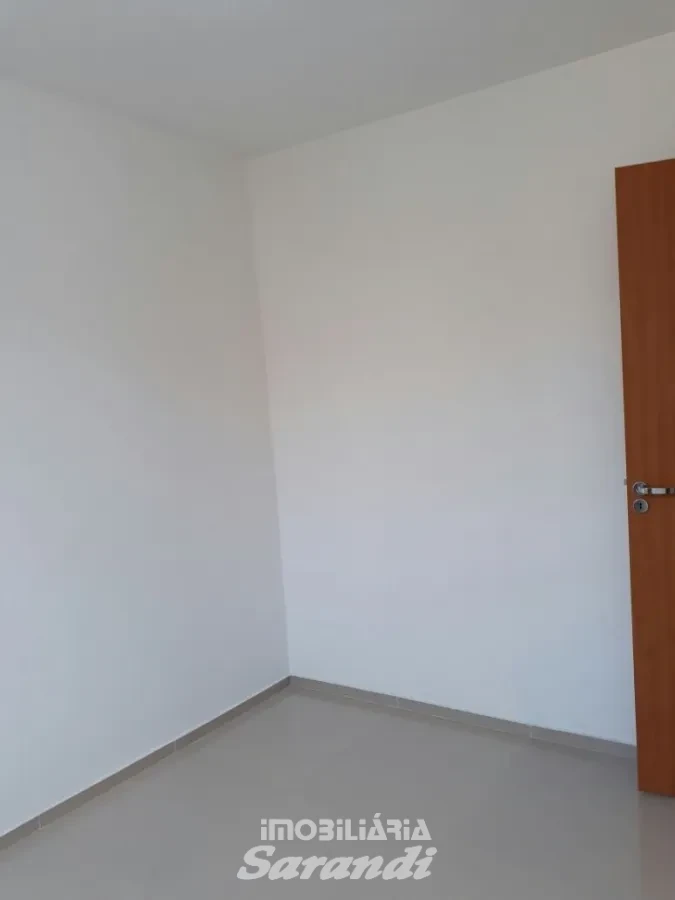 Imagem de Apartamento com garagem coberta dois dormitórios bairro Santa Fé Porto Alegre