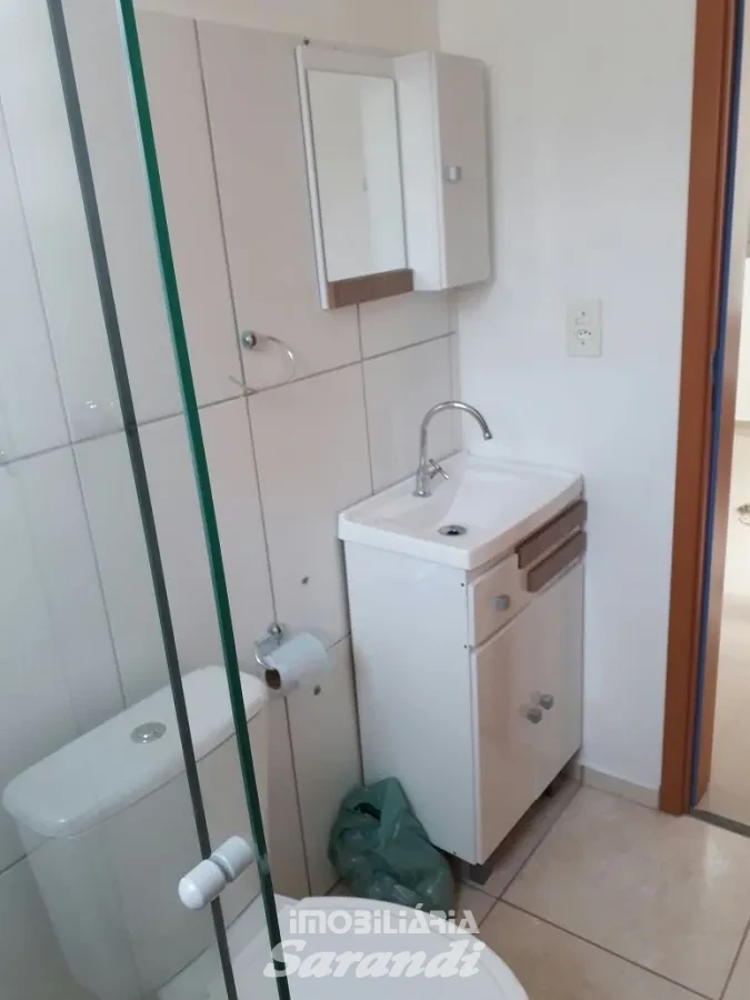 Imagem de Apartamento com garagem coberta dois dormitórios bairro Santa Fé Porto Alegre