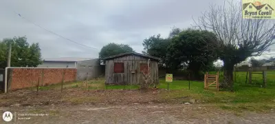 Imagem de TERRENO COM CASA DE MADEIRA