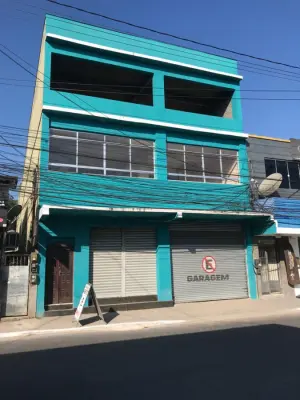 Imagem de Prédio com apartamento e loja