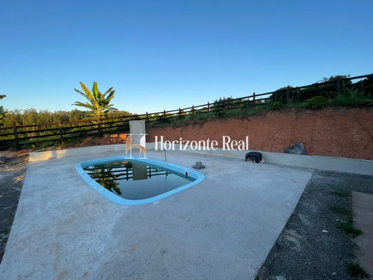 Imagem de VENDE-SE CHÁCARA  - 4000 M² COM CASA,PISCINA E CAFÉ PLANTADO