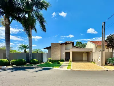 Imagem de Excelente casa em condomínio com 3 quartos, sendo 1 suíte,  piscina, quintal, area gourmet, jardim