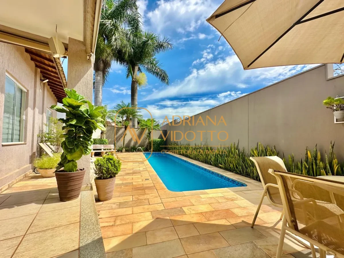 Imagem de Excelente casa em condomínio com 3 quartos, sendo 1 suíte,  piscina, quintal, area gourmet, jardim