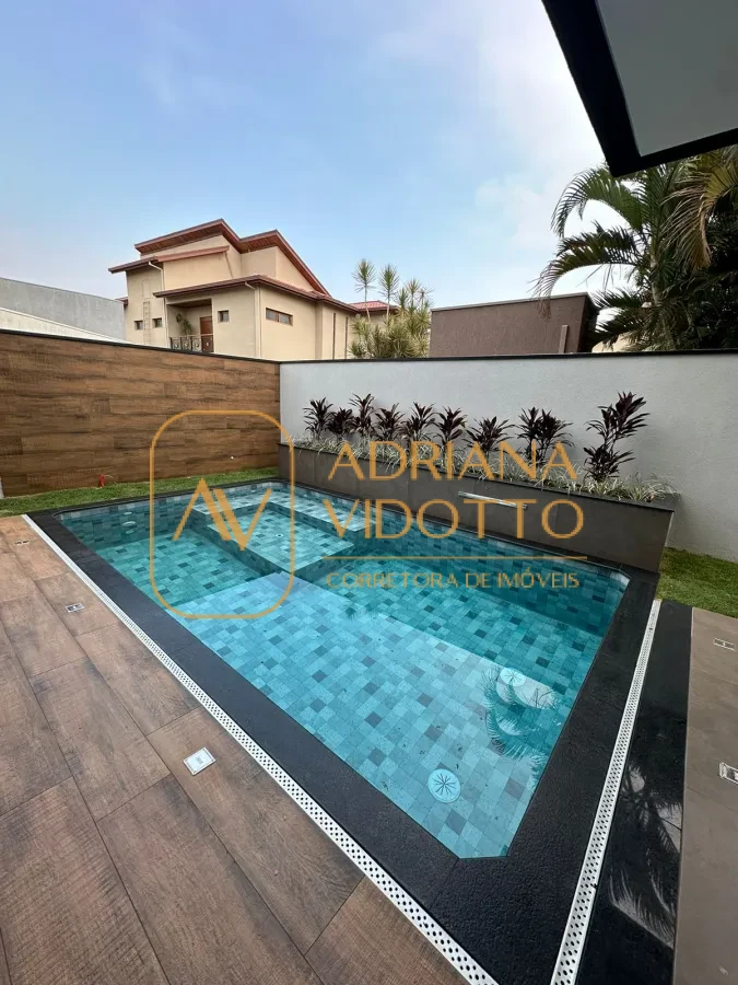 Imagem de CASA ALTO PADRÃO CONDOMÍNIO RESIDENCIAL PARQUE DAMHA COM 3 SUÍTES, ÁREA GOURMET COM PISCINA AQUECIDA