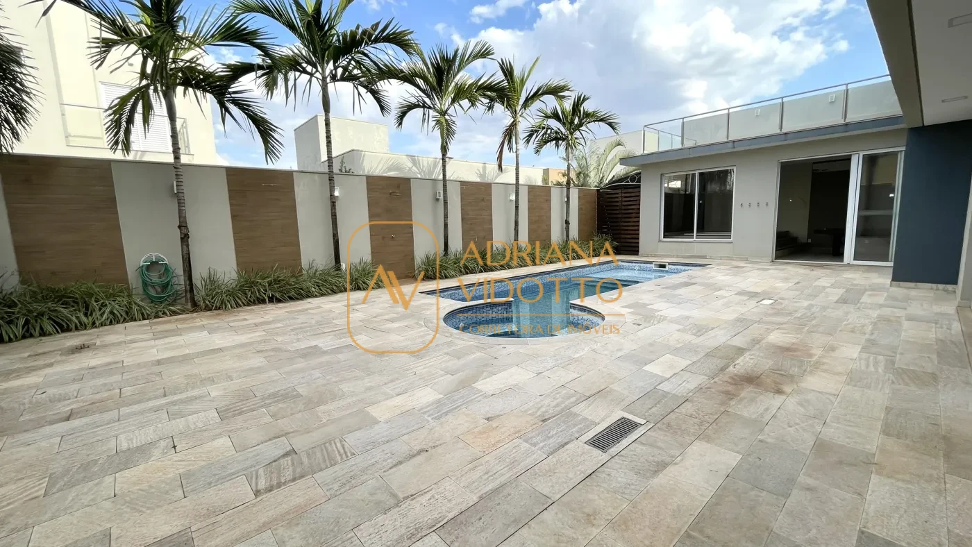 Imagem de IMÓVEL DE ALTO PADRÃO EM CONDOMÍNIO COM 4 SUÍTES, PISCINA, SALA DE JOGOS COM JACUZZI E CINEMA.