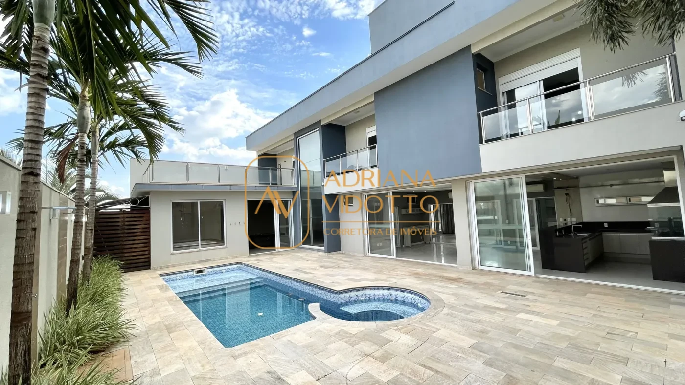 Imagem de IMÓVEL DE ALTO PADRÃO EM CONDOMÍNIO COM 4 SUÍTES, PISCINA, SALA DE JOGOS COM JACUZZI E CINEMA.