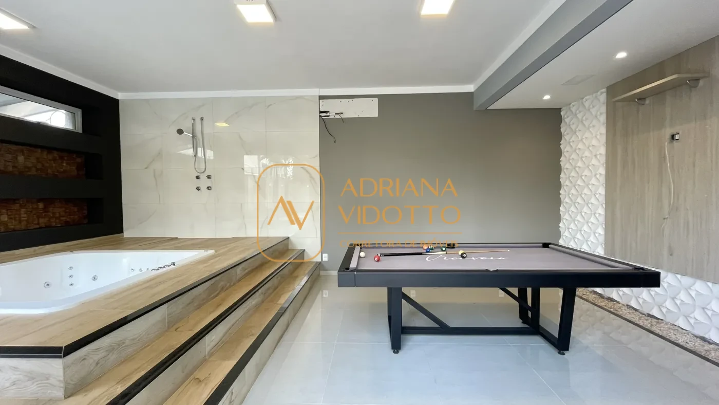Imagem de IMÓVEL DE ALTO PADRÃO EM CONDOMÍNIO COM 4 SUÍTES, PISCINA, SALA DE JOGOS COM JACUZZI E CINEMA.