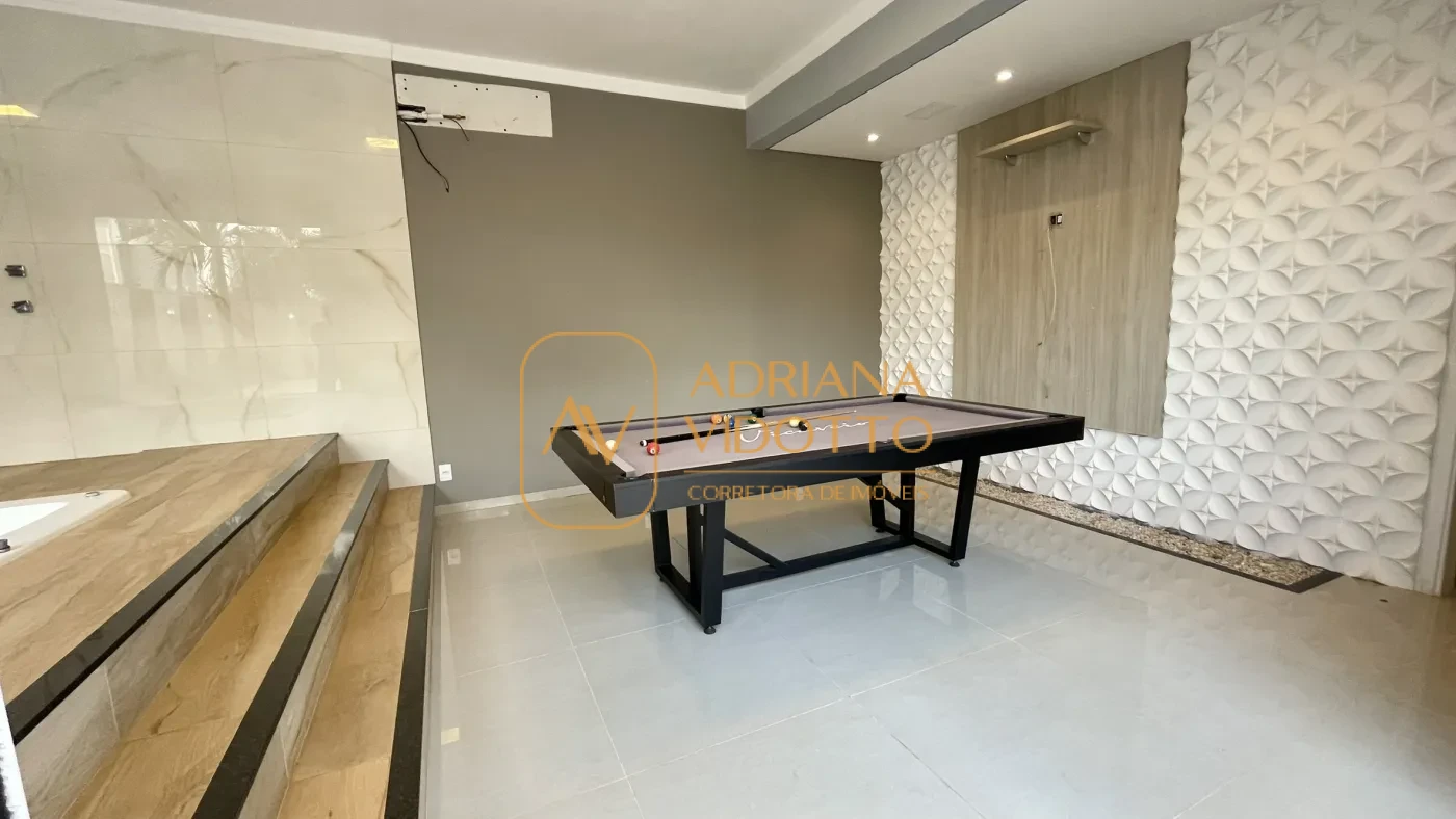 Imagem de IMÓVEL DE ALTO PADRÃO EM CONDOMÍNIO COM 4 SUÍTES, PISCINA, SALA DE JOGOS COM JACUZZI E CINEMA.