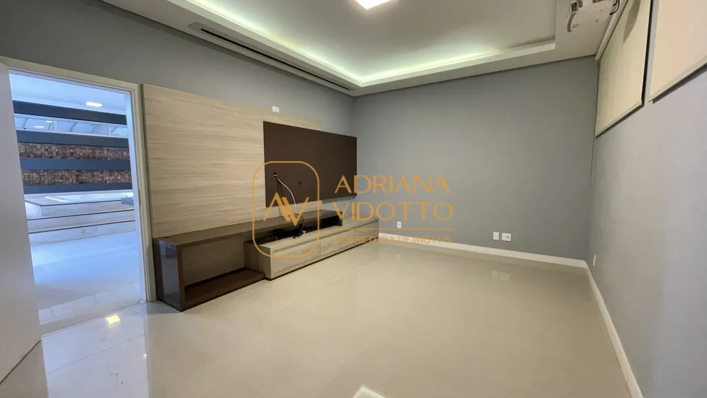 Imagem de IMÓVEL DE ALTO PADRÃO EM CONDOMÍNIO COM 4 SUÍTES, PISCINA, SALA DE JOGOS COM JACUZZI E CINEMA.