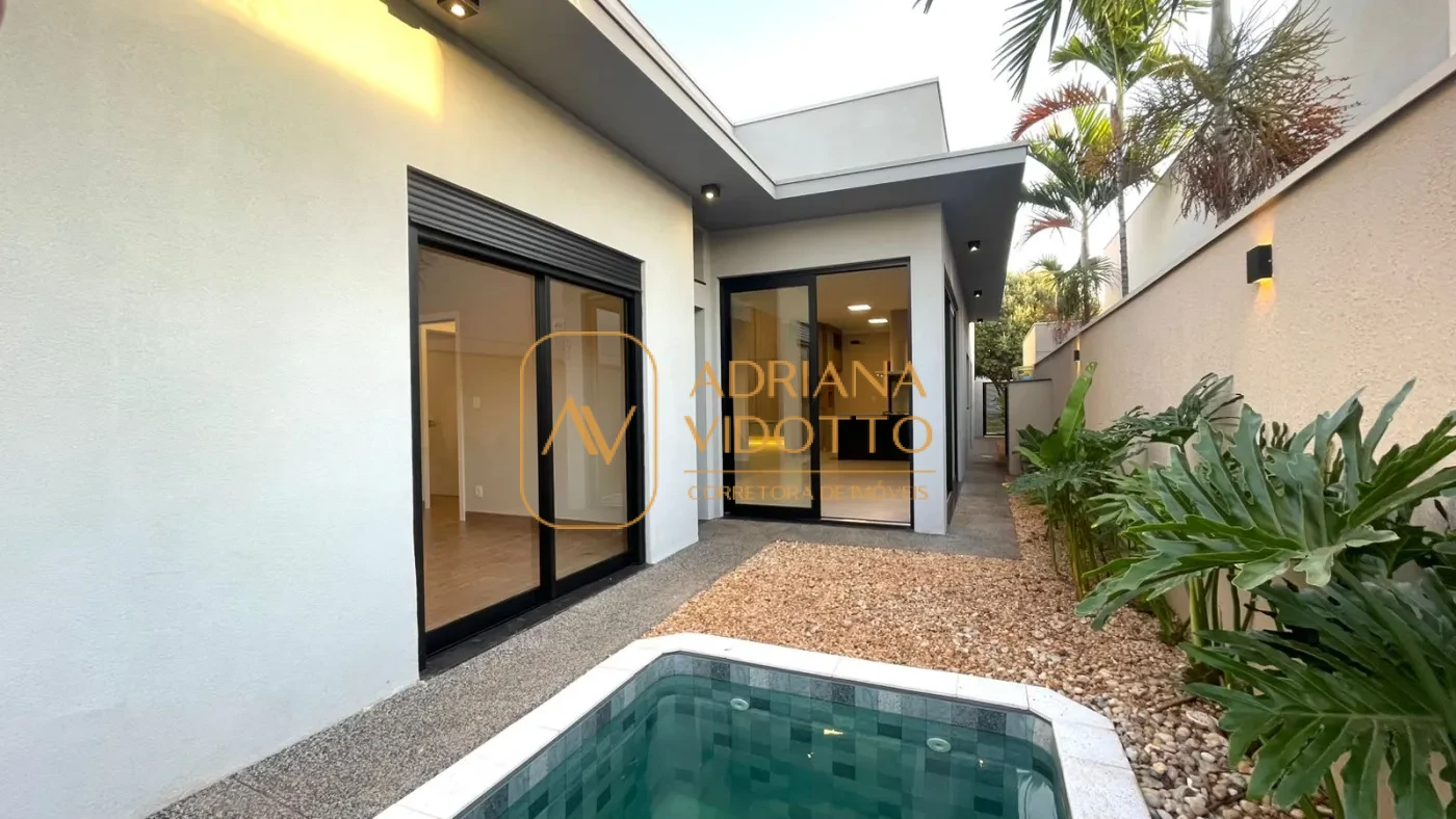 Imagem de CASA ALTO PADRÃO EM CONDOMÍNIO COM 3 SUÍTES, PISCINA E ESCRITÓRIO