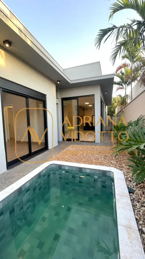 Imagem de CASA ALTO PADRÃO EM CONDOMÍNIO COM 3 SUÍTES, PISCINA E ESCRITÓRIO